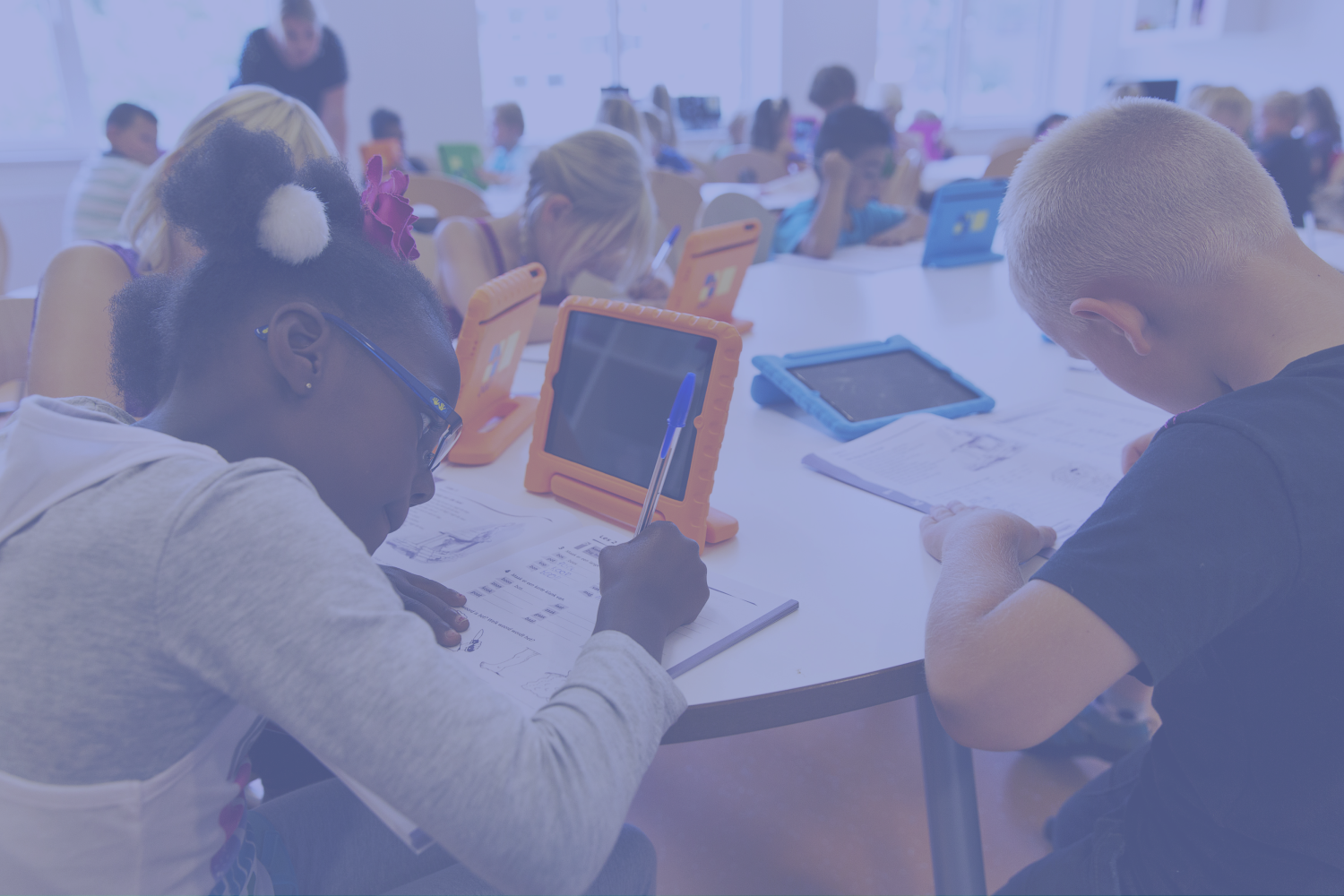 Children taking a test at desks