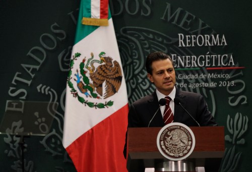 Mexican President Enrique Pena Nieto gives a speech during his proposal for energy reforms at Los Pinos presidential residence in Mexico City August 12, 2013. Nieto on Monday proposed a sweeping energy reform that would amend the constitution to offer private companies lucrative profit-sharing contracts, seeking to lure investment to stem sliding oil output.The proposal calls for changes to key articles of the constitution that ban certain contracts and make oil and gas exploitation the sole preserve of the state.If enacted, the reform would mark the largest private sector opening in decades for Mexico's oil and gas sector, which was nationalized in 1938. The government will send its proposals to Congress this week. REUTERS/Henry Romero (MEXICO - Tags: ENERGY POLITICS) - GM1E98D03ZH01