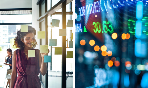 employee brainstorming with post-its and stock market ticker