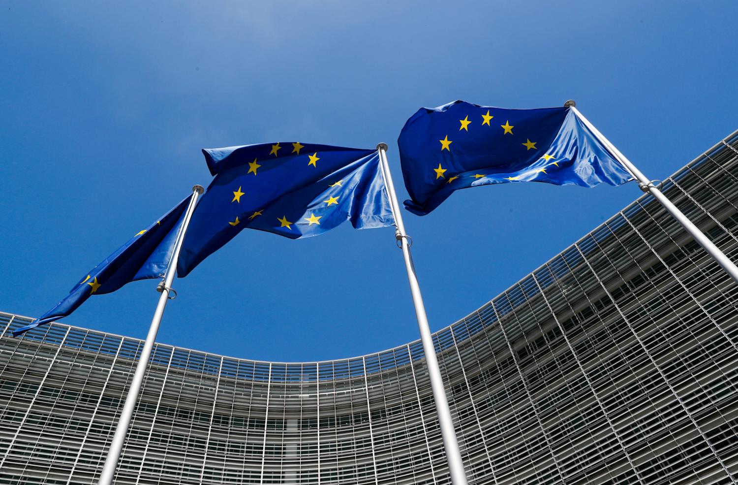 European Union flags flutter outside the EU Commission headquarters in Brussels, Belgium June 20, 2018. REUTERS/Yves Herman - RC1198648440