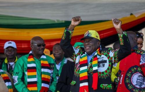 Zimbabwean President Emmerson Mnangagwa greets supporters before an explosion at an election rally in Bulawayo, Zimbabwe June 23, 2018. Tafadzwa Ufumeli/via REUTERS THIS IMAGE HAS BEEN SUPPLIED BY A THIRD PARTY. MANDATORY CREDIT. NO RESALES. NO ARCHIVES. - RC12AD0558B0