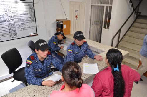 Inpec officers register FARC rebels before they leave El Buen Pastor prison in Bogota, Colombia January 20, 2016. Colombia's government released on Wednesday 16 of the 30 imprisoned FARC rebels the government had decided to pardon in late November. The move represents a unilateral gesture on behalf of the government, after assessing compliance with the unilateral ceasefire by The Revolutionary Armed Forces of Colombia (FARC) and as a consequence in the reduction of violence as the peace deal progresses.  REUTERS/Omar Nieto/high commissioner for peace /Handout via Reuters ATTENTION EDITORS - THIS PICTURE WAS PROVIDED BY A THIRD PARTY. REUTERS IS UNABLE TO INDEPENDENTLY VERIFY THE AUTHENTICITY, CONTENT, LOCATION OR DATE OF THIS IMAGE. FOR EDITORIAL USE ONLY. NOT FOR SALE FOR MARKETING OR ADVERTISING CAMPAIGNS. THIS PICTURE IS DISTRIBUTED EXACTLY AS RECEIVED BY REUTERS, AS A SERVICE TO CLIENTS. - GF20000102631