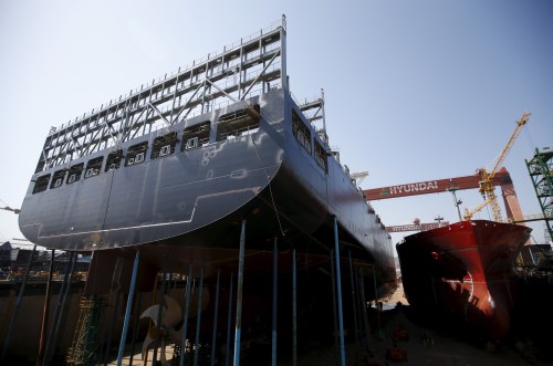 Ships which are currently under construction, are seen at Hyundai Heavy Industries' Shipyard in Ulsan, South Korea, May 13, 2015. The port of Ulsan was the cradle of South Korea's breakneck industrialization. Now, the main production site for big manufacturers such as Hyundai Motor and oil refiner SK Innovation risks becoming the country's rust belt. Picture taken May 13, 2015. REUTERS/Kim Hong-Ji - GF10000102783