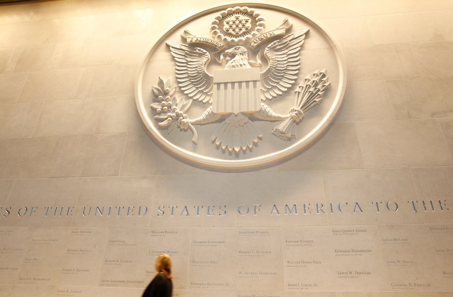 The main lobby entrance with a large Department of State embossed seal, along with all the names of the ambassadors to the Court of St James's is seen in the new United States embassy building is seen during a press preview near the River Thames in London, Britain December 13, 2017. REUTERS/Alastair Grant/Pool - RC1CB9CDC940