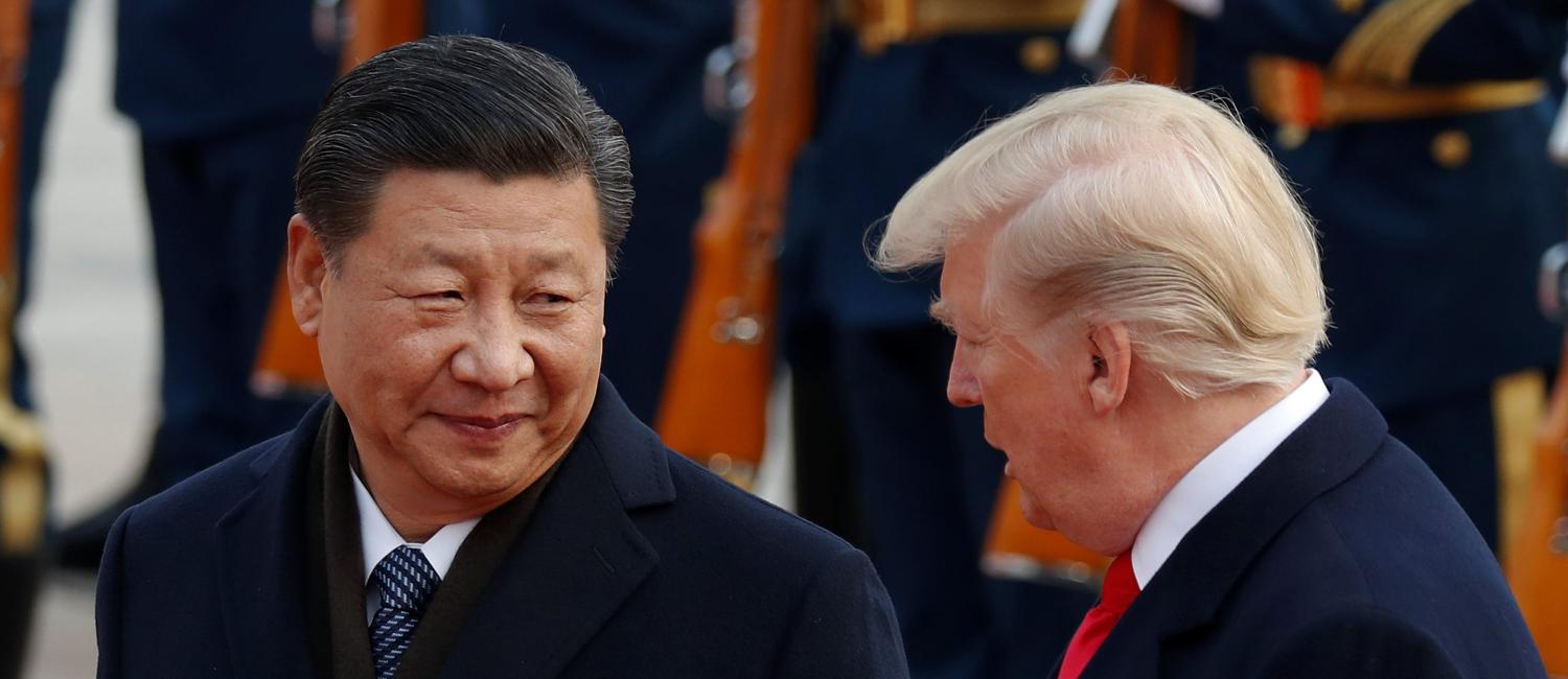 U.S. President Donald Trump takes part in a welcoming ceremony with China's President Xi Jinping at the Great Hall of the People in Beijing, China, November 9, 2017. REUTERS/Damir Sagolj - RC1CB94FD460