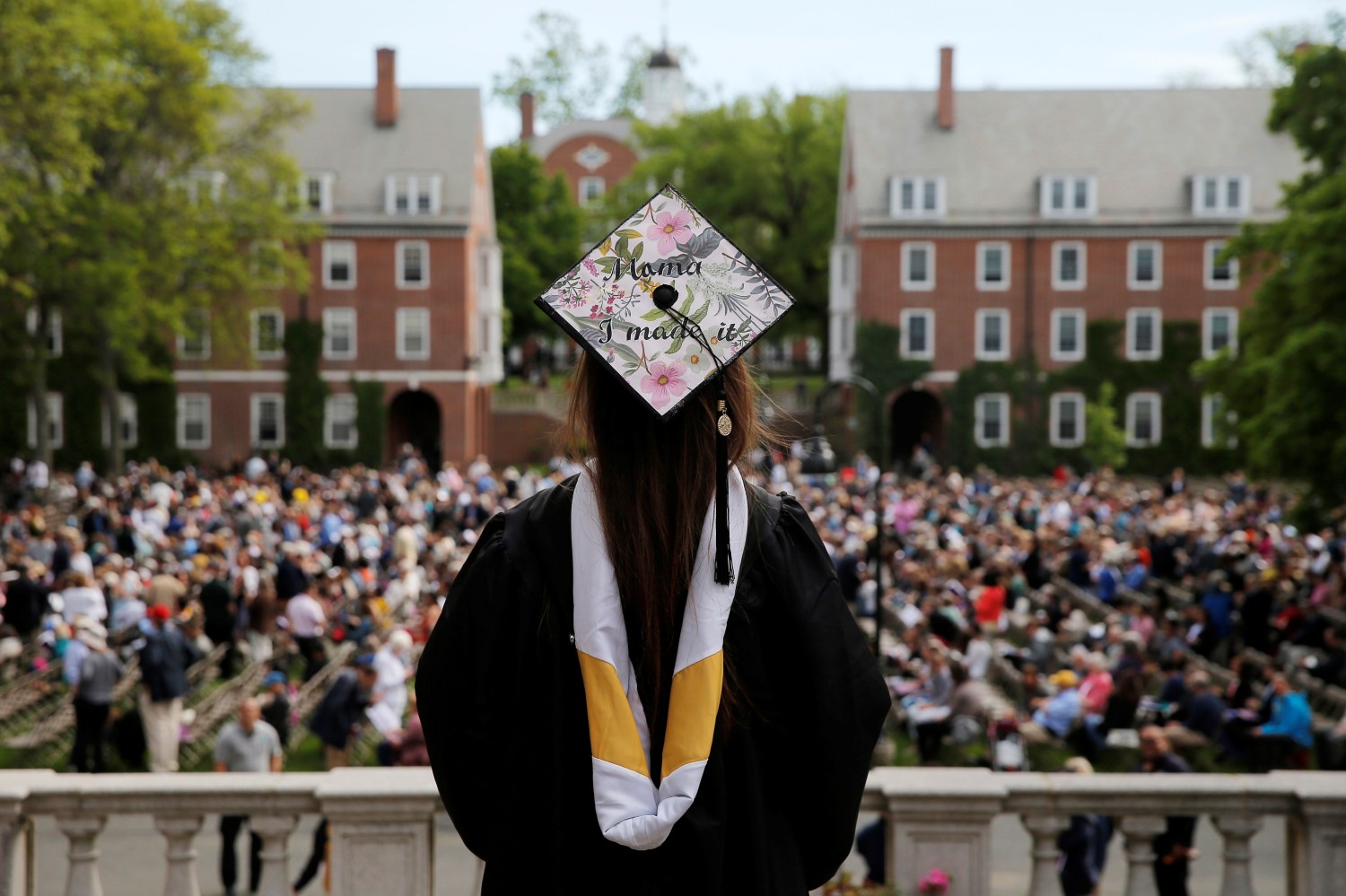 College graduate with her cap at a commencement ceremony.
