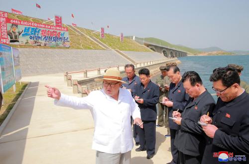 North Korean leader Kim Jong Un inspects the completed railway that connects Koam and Dapchon, in this undated photo released by North Korea's Korean Central News Agency (KCNA) in Pyongyang May 24, 2018.