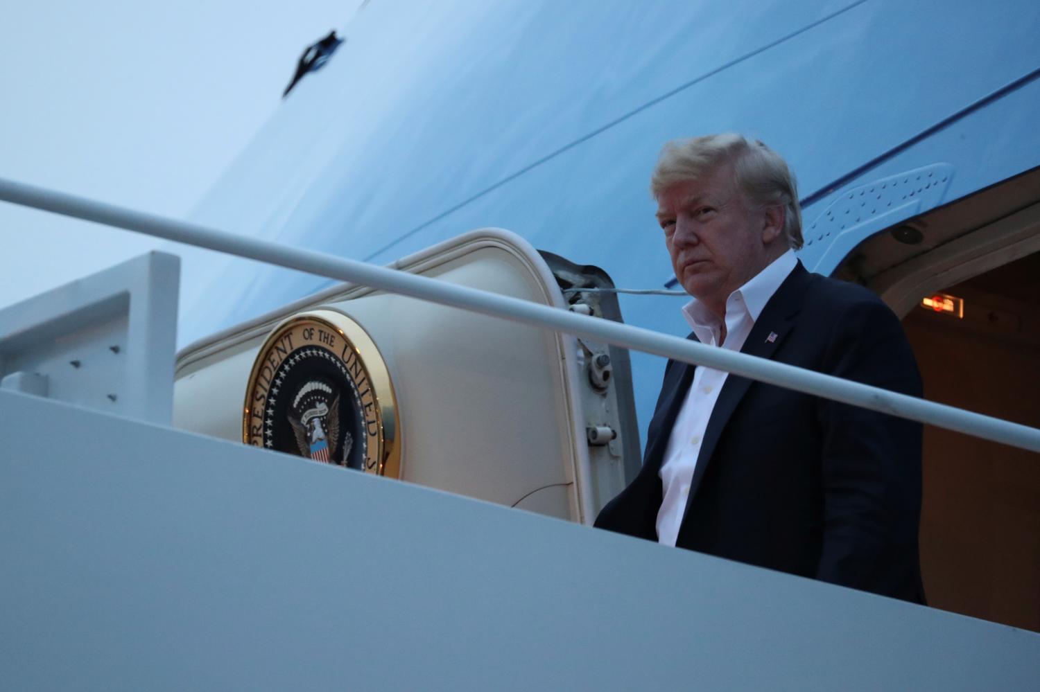 U.S. President Donald Trump arrives aboard Air Force One from Singapore at Joint Base Andrews, Maryland, U.S. June 13, 2018. REUTERS/Jonathan Ernst - RC19029A9A30