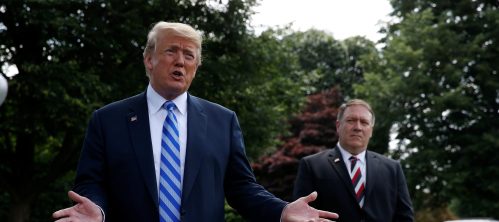 U.S. President Donald Trump talks with the media as U.S. Secretary of State Mike Pompeo looks on after a meeting with North Korea's envoy Kim Yong Chol at the White House in Washington, U.S., June 1, 2018. REUTERS/Leah Millis - RC1A4DC63180