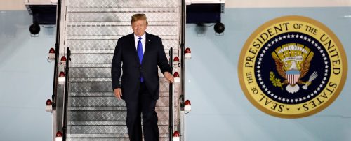 U.S. President Donald Trump steps off his plane as he arrives at Paya Lebar Air Base in Singapore, ahead of a summit with North Korean leader Kim Jong Un, June 10, 2018.  REUTERS/Kim Kyung-Hoon - RC15A5604450