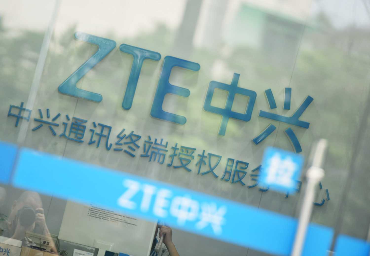 A sign of ZTE Corp is pictured at its service centre in Hangzhou, Zhejiang province, China May 14, 2018. REUTERS/Stringer  ATTENTION EDITORS - THIS IMAGE WAS PROVIDED BY A THIRD PARTY. CHINA OUT. - RC1F43CD5980