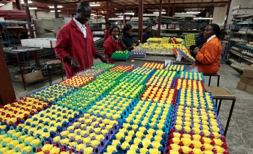 Workers arrange fresh roses at the Vermont Flowers export processing zone (EPZ) factory in Kenya's capital Nairobi March 10, 2011. Vermont claims their technique allows real blossoms and leaves to retain their natural appearance for long periods of time after being plucked, according to their website. A Kenyan company, Vermont benefits greatly from the African Growth and Opportunity Act (AGOA), which has granted duty-free access for many sub-Saharan African nations' products into the U.S. since 2000. REUTERS/Thomas Mukoya (KENYA - Tags: SOCIETY EMPLOYMENT BUSINESS) - GM1E73A1Q6T01