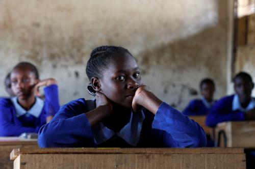 A pupil sits inside a classroom ahead of the primary school final national examinations at a primary school in East Africa. REUTERS/Thomas Mukoya - RC1294BA3D70