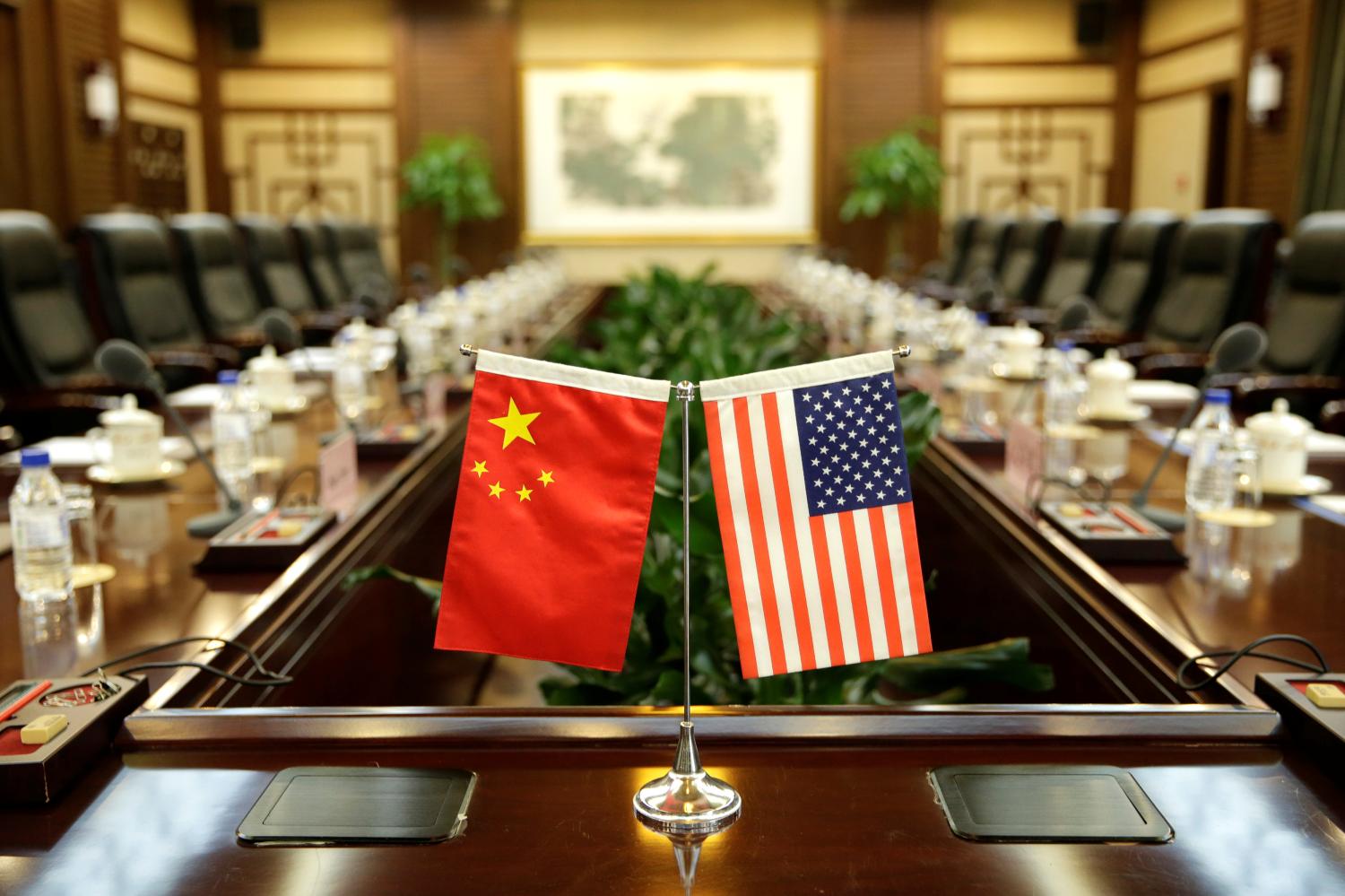 Flags of U.S. and China are placed for a meeting between Secretary of Agriculture Sonny Perdue and China's Minister of Agriculture Han Changfu at the Ministry of Agriculture in Beijing, China June 30, 2017. REUTERS/Jason Lee - RC1A8F925660