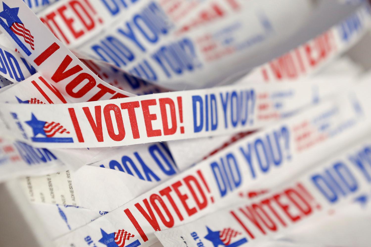 Wristbands for voters are seen at a polling station during early voting in Chicago, Illinois, U.S., October 14, 2016.    REUTERS/Jim Young  - S1BEUGZDWAAA