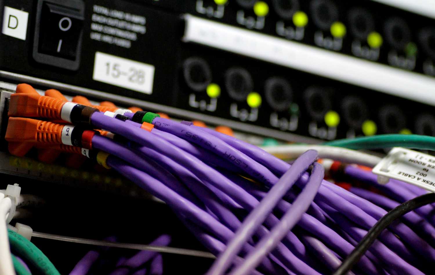 LAN network cables plugged into a computer server in Singapore July 26, 2017.   REUTERS/Thomas White - RC1BA1A425F0