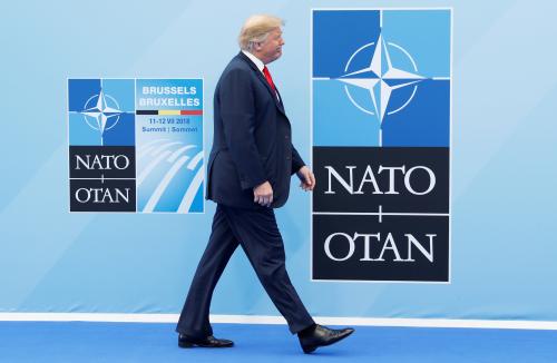 U.S. President Donald Trump is welcomed by NATO Secretary-General Jens Stoltenberg at the start of a NATO summit at the Alliances headquarters in Brussels, Belgium July 11, 2018.  REUTERS/Kevin Lamarque - RC118A306E20