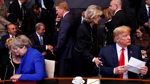 Britain's Prime Minister Theresa May  and U.S. President Donald Trump attend a meeting of the North Atlantic Council during a NATO summit in Brussels, Belgium July 11, 2018. REUTERS/Francois Lenoir - RC12B187B3E0