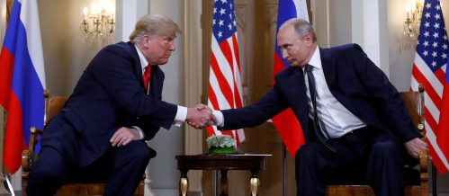 U.S. President Donald Trump and Russia's President Vladimir Putin shake hands as they meet in Helsinki, Finland July 16, 2018. REUTERS/Kevin Lamarque     TPX IMAGES OF THE DAY - RC19BE6D3090