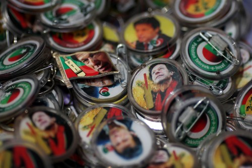 Pins with images of Imran Khan, leader of the Pakistan Tehreek-e-Insaf (PTI), are pictured at a market a day after general election in Islamabad, Pakistan, July 26, 2018. REUTERS/Athit Perawongmetha - RC11759567A0