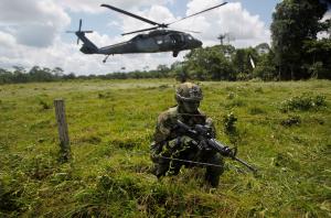 A Colombian soldier watches over the border with Ecuador in Narino, Colombia April 18, 2018. REUTERS/Fredy Builes - RC1682927870