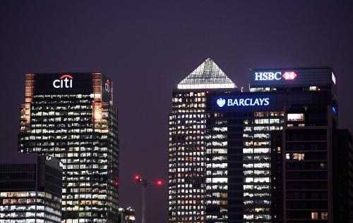 Office blocks of Citi, Barclays, and HSBC banks are seen at dusk in the Canary Wharf financial district in London, Britain November 16, 2017. REUTERS/Toby Melville - RC1813E62240