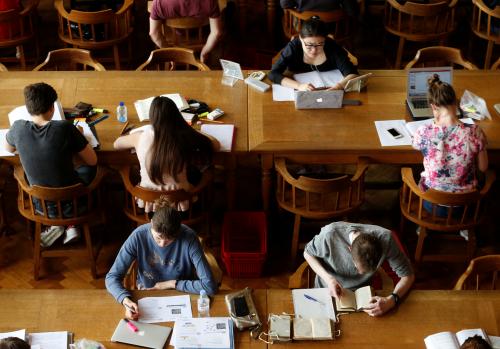 Students sit in the library of the university KU Leuven "Katholieke Universiteit Leuven" in Leuven, Belgium