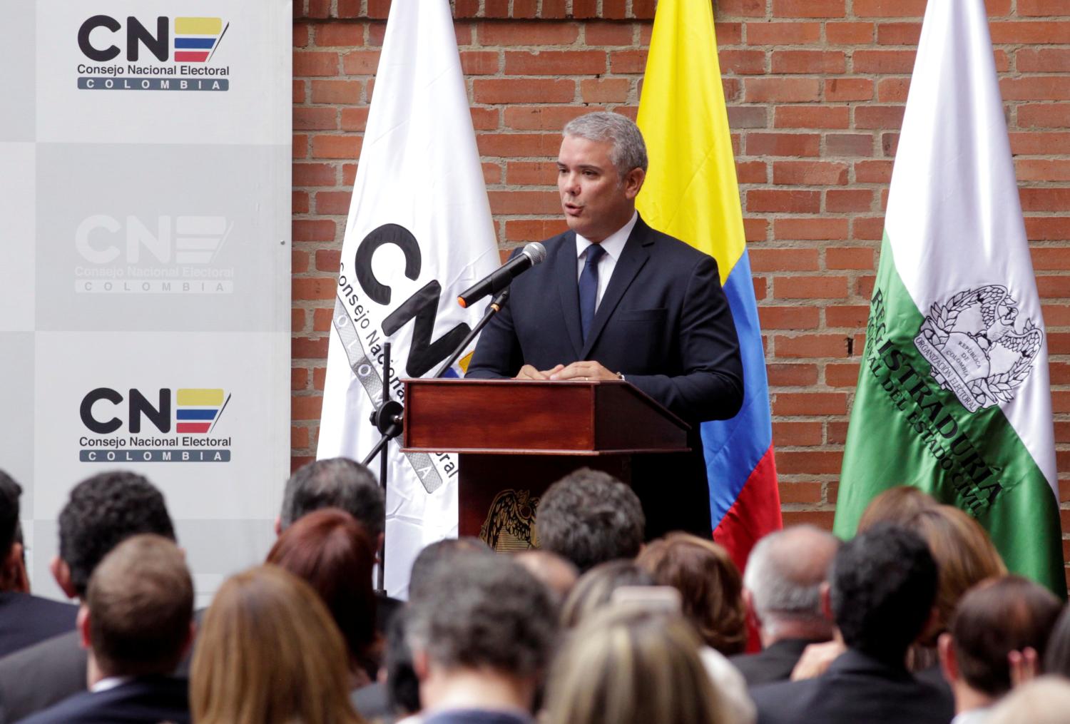 Colombia's President-Elect Ivan Duque addresses the audience after receiving his credentials from the election council, in Bogota, Colombia July 16, 2018. REUTERS/Luisa Gonzalez - RC114FCC4240