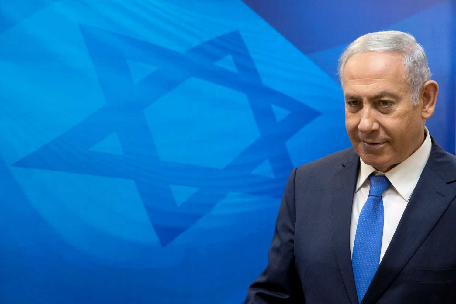 Israeli Prime Minister Benjamin Netanyahu arrives to the weekly cabinet meeting at the Prime Minister's office in Jerusalem,  July 29, 2018. Sebastian Scheiner /Pool via Reuters *** Local Caption *** - RC1F49FF0D00