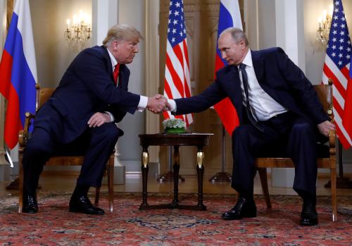 U.S. President Donald Trump and Russia's President Vladimir Putin shake hands as they meet in Helsinki, Finland July 16, 2018. REUTERS/Kevin Lamarque     TPX IMAGES OF THE DAY - RC19BE6D3090