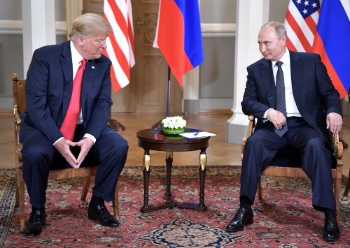 Russia's President Vladimir Putin (R) and U.S. President Donald Trump attend a meeting in Helsinki, Finland July 16, 2018. Sputnik/Alexei Nikolsky/Kremlin via REUTERS  ATTENTION EDITORS - THIS IMAGE WAS PROVIDED BY A THIRD PARTY. - RC1AA427BD00