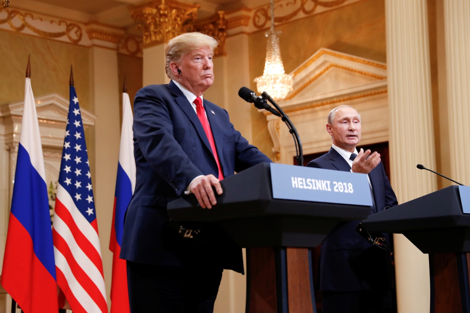 Russia's President Vladimir Putin gestures during a joint news conference with U.S. President Donald Trump after their meeting in Helsinki, Finland, July 16, 2018. REUTERS/Kevin Lamarque - RC1B10C69EC0