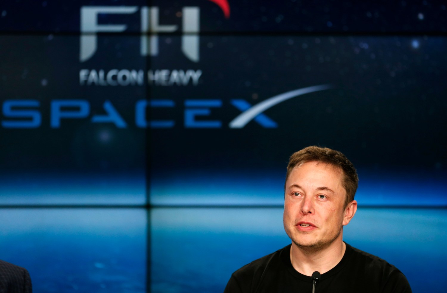 FILE PHOTO: SpaceX founder Elon Musk speaks at a press conference following the first launch of a SpaceX Falcon Heavy rocket at the Kennedy Space Center in Cape Canaveral, Florida, U.S., February 6, 2018. REUTERS/Joe Skipper/File Photo - RC15B6B3A870