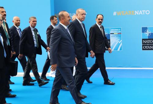 Turkish President Tayyip Erdogan, Turkey's Foreign Minister Mevlut Cavusoglu together with the Turkish delegation arrive for the second day of a NATO summit in Brussels, Belgium, July 12, 2018. Tatyana Zenkovich/Pool via REUTERS - RC1DBADEAD70