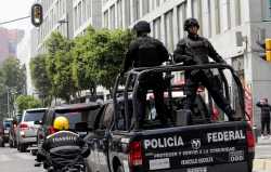 Police guard a convoy of cars, including one transporting Jared Kushner, senior adviser to U.S. President Donald Trump, after a visit to Mexico's Ministry of Foreign Affairs in Mexico City, Mexico March 7, 2018. REUTERS/Henry Romero - RC12A6A8BBB0
