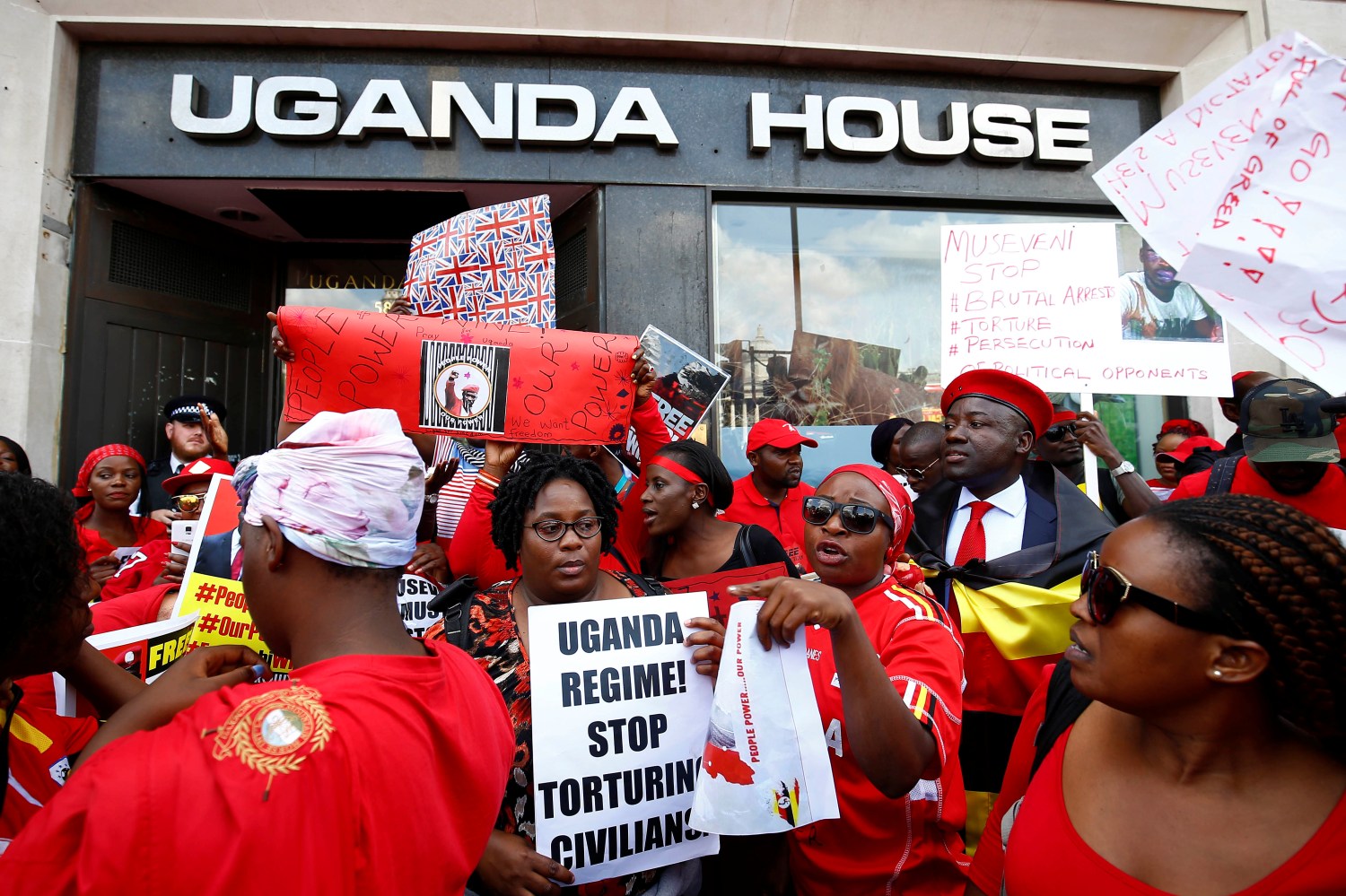 Protesters demonstrate against Ugandan President Yoweri Museveni outside Uganda House in London, Britain. Aug 23, 2018. REUTERS/Henry Nicholls - RC1E84EF2C20
