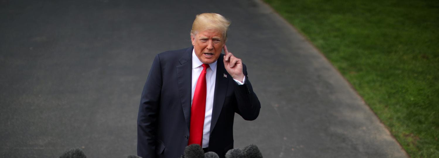 U.S. President Donald Trump speaks to the media before departing the White House for a trip to New York, in Washington, U.S. May 23, 2018. REUTERS/Carlos Barria     TPX IMAGES OF THE DAY - RC1EC248F200