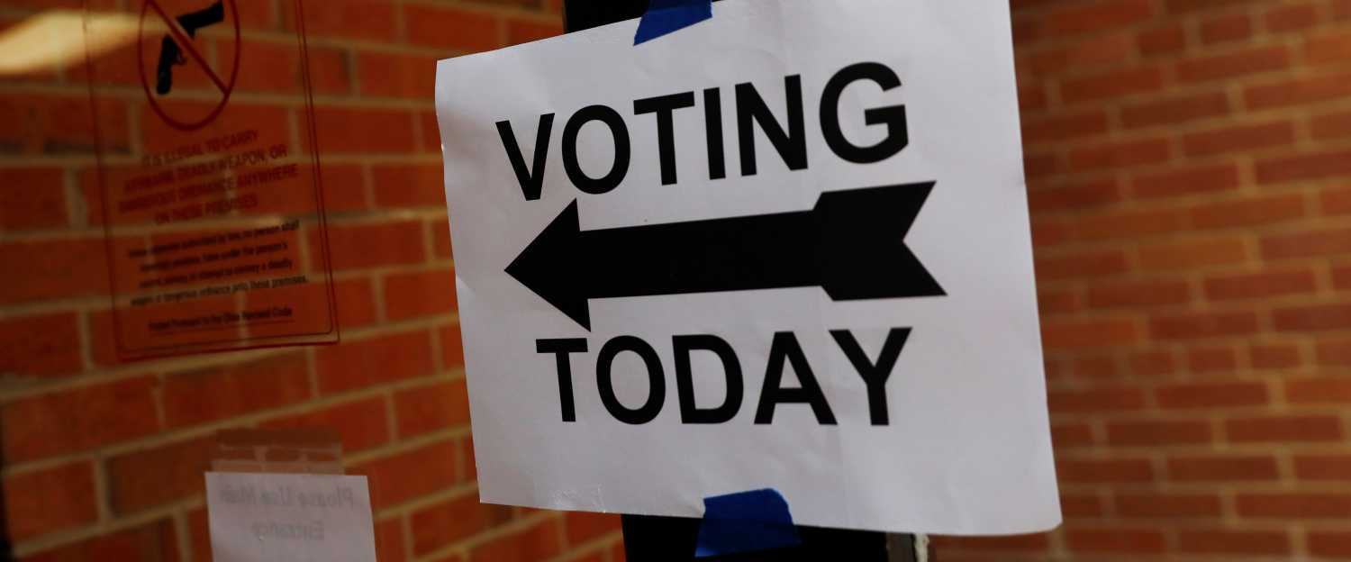 A voting sign is seen during Ohio's 12th congressional special election in Columbus, Ohio, U.S., August 7, 2018. REUTERS/Shannon Stapleton - RC1255C29780