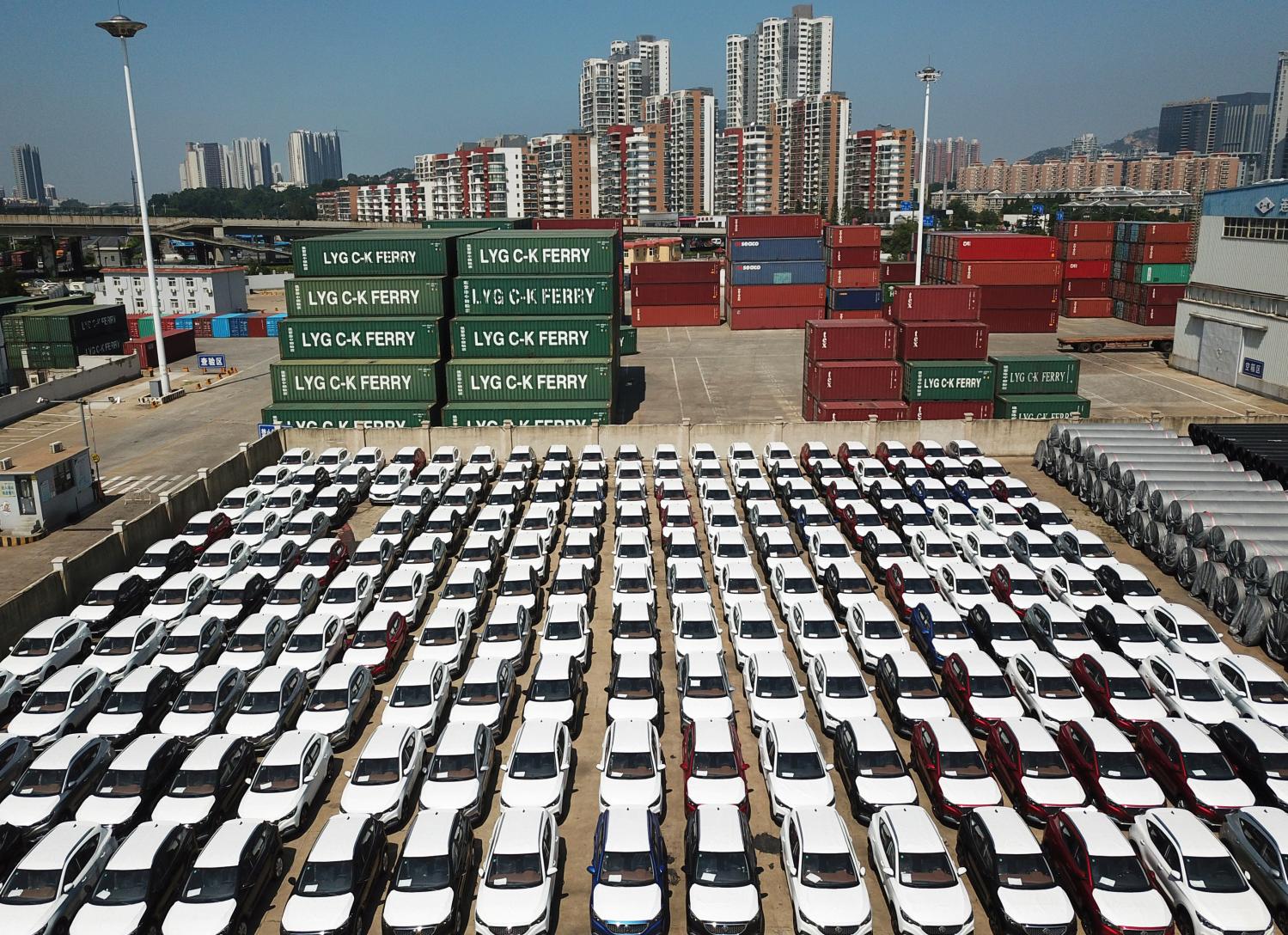 Cars to be exported sit at a port in Lianyungang, Jiangsu province, China August 8, 2018. REUTERS/Stringer ATTENTION EDITORS - THIS IMAGE WAS PROVIDED BY A THIRD PARTY. CHINA OUT.     REUTERS/Stringer - RC1BE44D4870