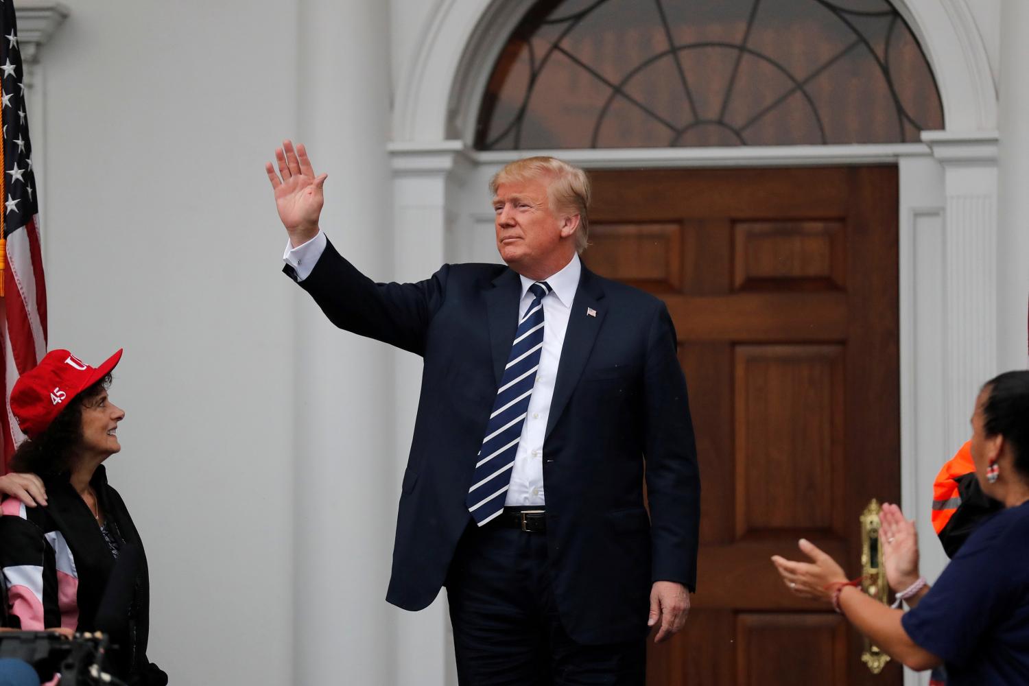 U.S. President Donald Trump meets with supporters from a group called "Bikers for Trump" at Trump National Golf Club in Bedminster, New Jersey, U.S., August 11, 2018. REUTERS/Carlos Barria - RC1F32820180