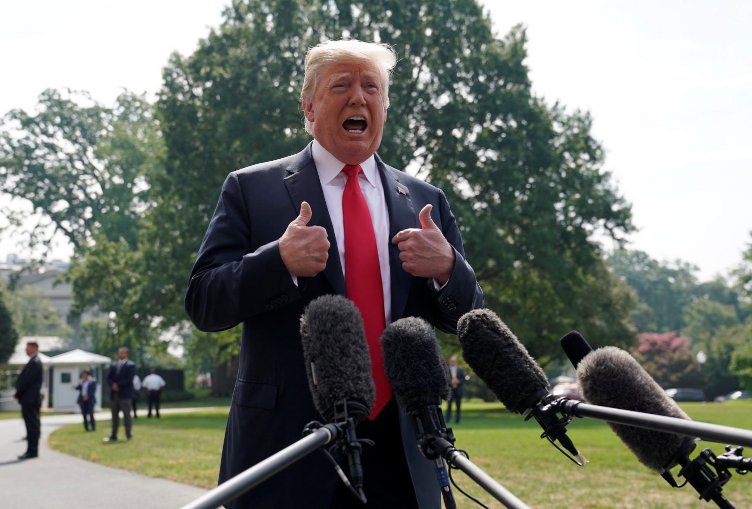 U.S. President Donald Trump speaks to reporters upon his departure from the White House in Washington, U.S., August 17, 2018.  REUTERS/Kevin Lamarque - RC1608940950