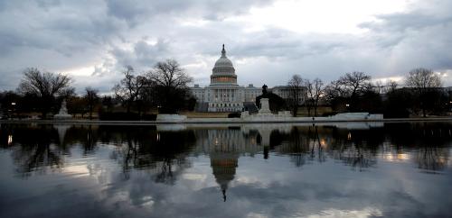 Clouds pass over the U.S. Capitol at the start of the third day of a shut down of the federal government in Washington, U.S., January 22, 2018.      REUTERS/Joshua Roberts - RC12F4FE0800