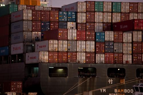 The YM Bamboo, a container ship operated by the China Ocean Shipping Company (COSCO) is docked at the Port of Oakland in Oakland, California January 14, 2011. Chinese President Hu Jintao will bring new business deals and possible commitments to buy U.S. beef and software when he visits Washington next week, the U.S. Chamber of Commerce said on Friday. REUTERS/Beck Diefenbach   (UNITED STATES - Tags: BUSINESS) - GM1E71F0XG601