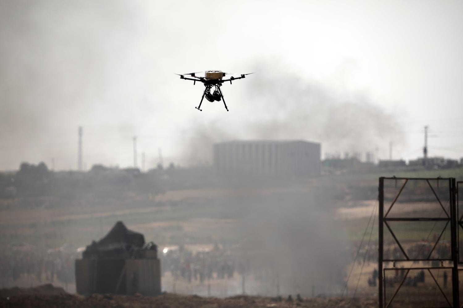 An Israeli drone is seen in action over the border between Israel and Gaza during a protest on the Gaza side June 8, 2018. REUTERS/Amir Cohen - RC133A224370