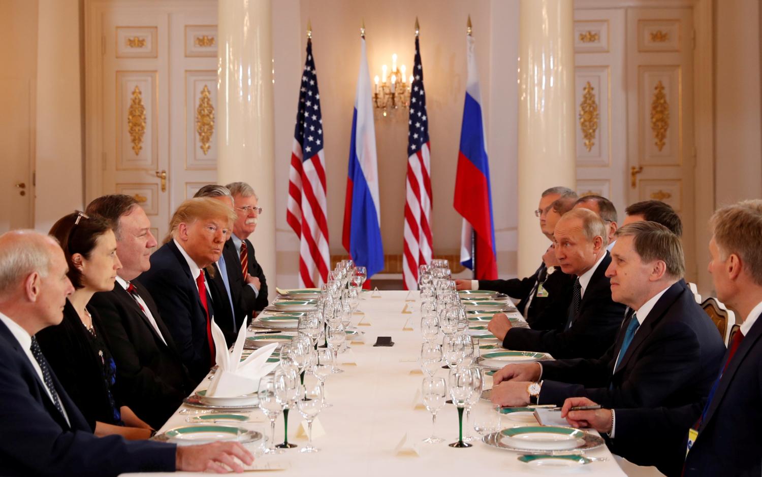 U.S. President Donald Trump participates in an expanded bilateral meeting with Russia's President Vladimir Putin in Helsinki, Finland, July 16, 2018. REUTERS/Kevin Lamarque     TPX IMAGES OF THE DAY - RC1497F0B200