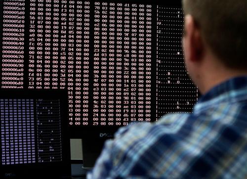An analyst looks at code in the malware lab of a cyber security defense lab at the Idaho National Laboratory in Idaho Falls, Idaho September 29, 2011. REUTERS/Jim Urquhart