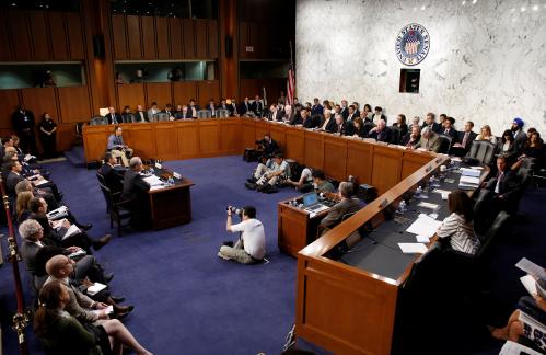 Director of the Federal Bureau of Investigation Christopher Wray and Department of Justice Inspector General Michael Horowitz testify before a Senate Judiciary Committee hearing on the inspector generals first report on Justice Department and FBI actions in advance of the 2016 Presidential Election on Capitol Hill in Washington, U.S., June 18, 2018.      REUTERS/Joshua Roberts - RC1CAC235CD0