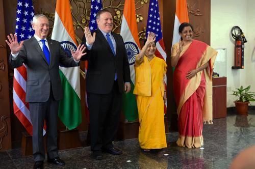 U.S. Defense Secretary James N. Mattis, U.S. Secretary of State Michael Pompeo, Indian Minister of External Affairs Sushma Swaraj and Indian Defense Minister Nirmala Sitharaman wave to reporters, at the Ministry of Foreign Affairs Jawaharlal Nehru Bhawan, New Delhi, India, Sept. 6, 2018. The leaders are meeting for the first ever U.S.-India 2+2 ministerial dialogue in which they are affirming their commitment to enhancing the U.S.-India relationship. DoD photo by Lisa Ferdinando