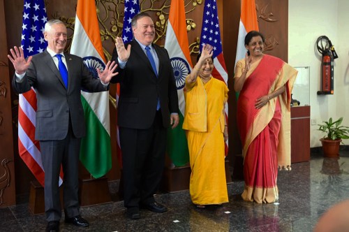 U.S. Defense Secretary James N. Mattis, U.S. Secretary of State Michael Pompeo, Indian Minister of External Affairs Sushma Swaraj and Indian Defense Minister Nirmala Sitharaman wave to reporters, at the Ministry of Foreign Affairs Jawaharlal Nehru Bhawan, New Delhi, India, Sept. 6, 2018. The leaders are meeting for the first ever U.S.-India 2+2 ministerial dialogue in which they are affirming their commitment to enhancing the U.S.-India relationship. DoD photo by Lisa Ferdinando