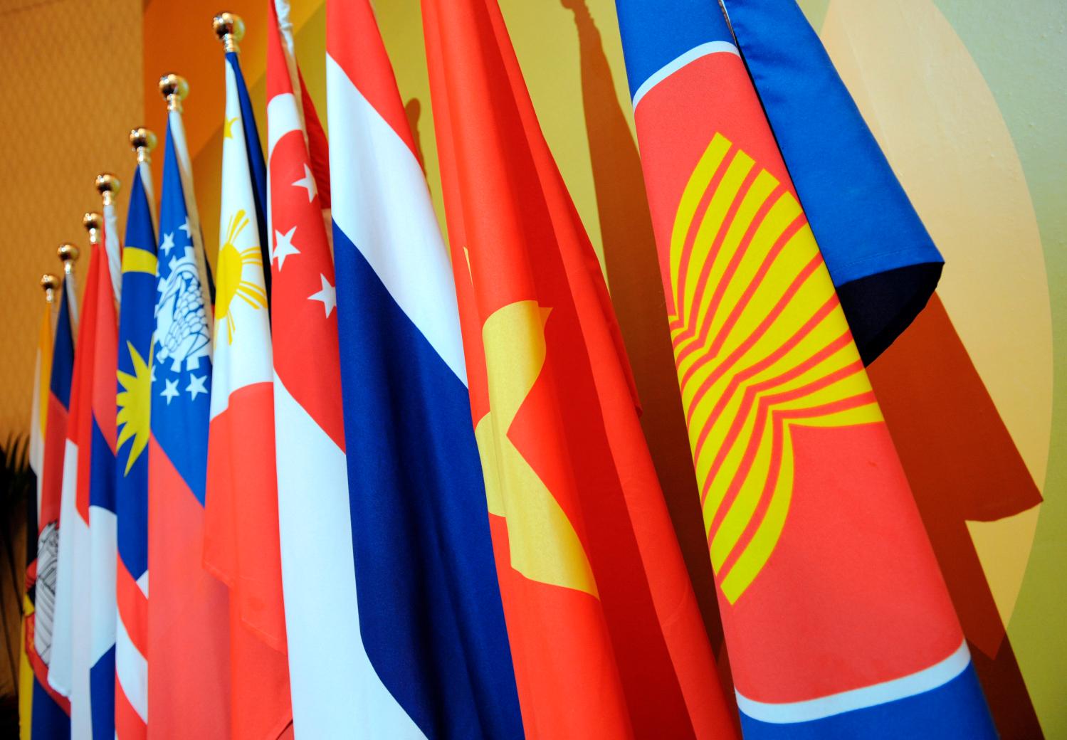 The Association of Southeast Asian Nations (ASEAN) flag leads the flags of the 10-member countries during the ASEAN Regional Forum meeting in Singapore.